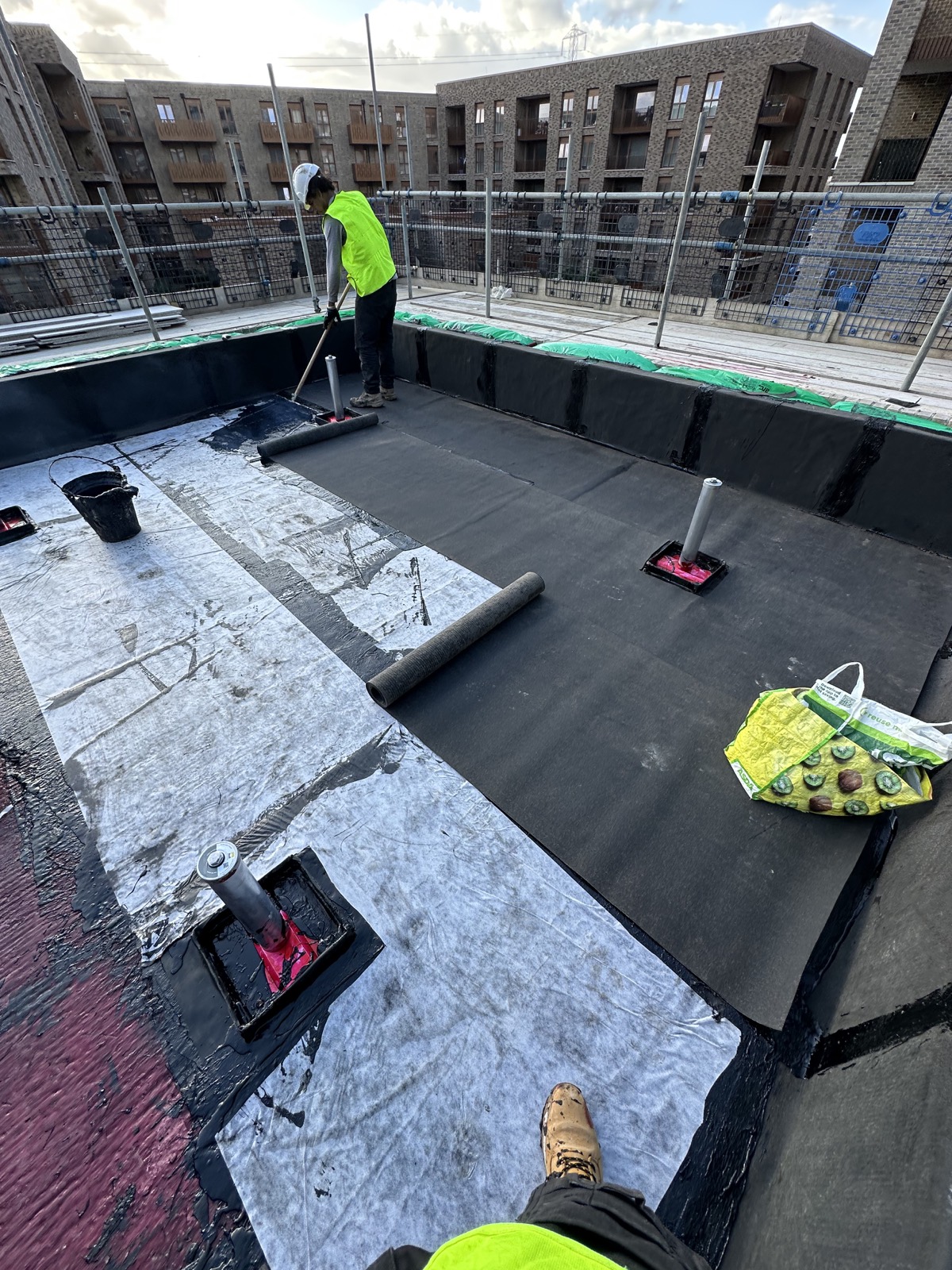 During stage of hot melt waterproofing work.